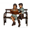 Boy and girl metal crafts bronze children reading statue for garden